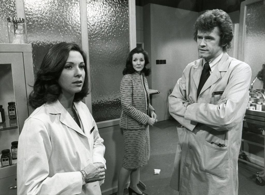 Marie Masters (Susan Burke Stewart), Kathryn Hays (Kim Dixon) and John Reilly (Dr. Dan Stewart) on as the world turns