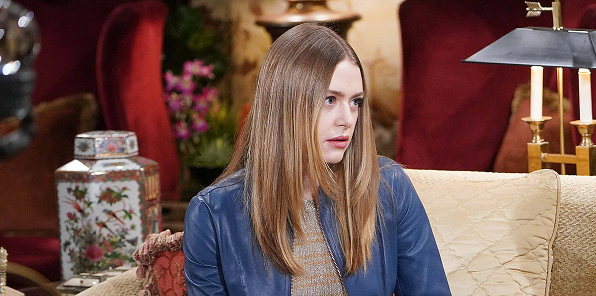 hayley erin as claire on young and restless, sitting on a couch.