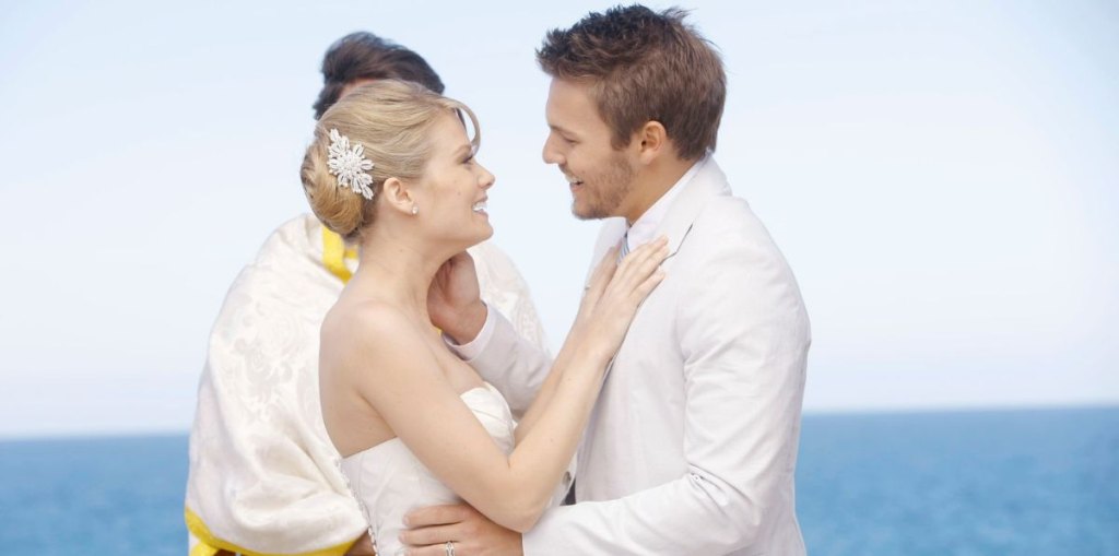 scott clifton as liam in a white tux with kim matula as hope in wedding gown on bold and beautiful.