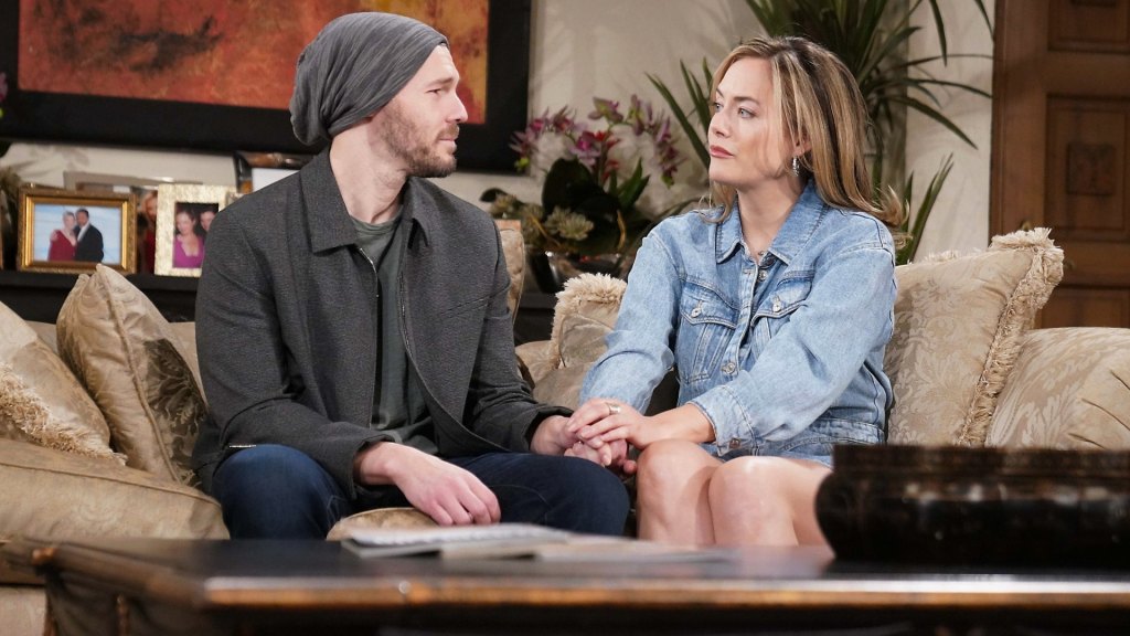 scott clifton as liam holding hands with annika noelle as hope on bold and beautiful.