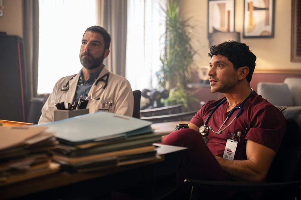 Dr. Wolf and Scotty on an episode of Brilliant Minds.