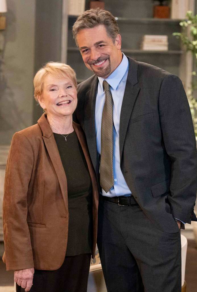 Erika Slezak and Chris McKenna posing on the General Hospital set in 2025