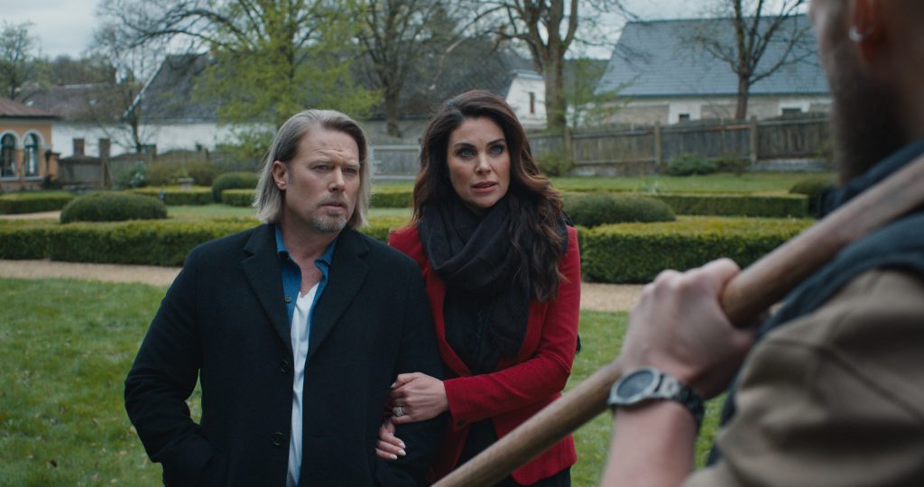 Jacob Young and Nadia Bjorlin in a scene from A Murder Between Friends, 2026