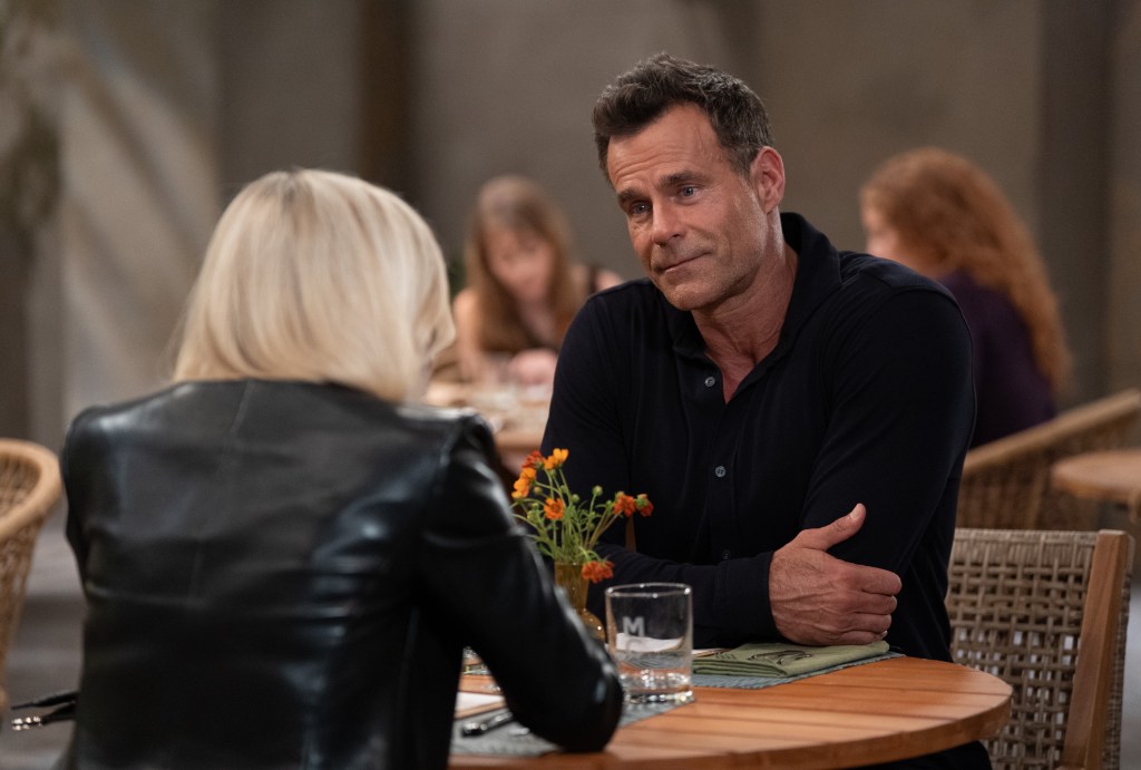 Cameron Mathison's Drew looking at Maura West's Ava on General Hospital